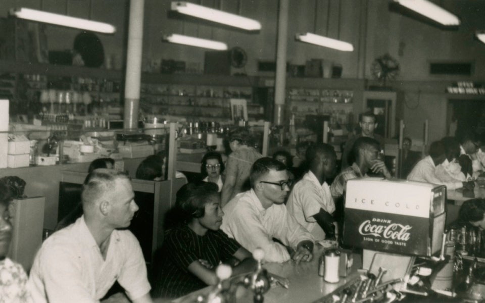African American and White students during a sit-in protest at a restaurant on the Drag (Dolph Briscoe Center for American History, UT Austin)